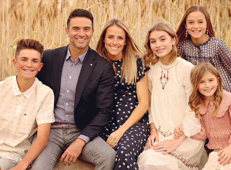 Photo of AIM Member Emily Layton with husband and 4 children
