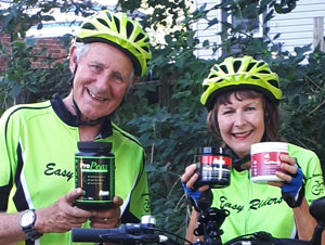 Photo of AIM Members Darlene and Kees Vandermey wearing bike helmets before a bike ride