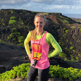 Photo of Danae Songy with mountains in the background